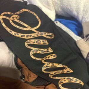 Cute lepored and black sweat pants